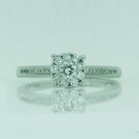 FR2196 18CT WG CLUSTERED DIAMOND RING TDW= 0.35CT